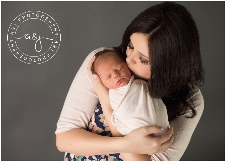 newborn boy and mother photo