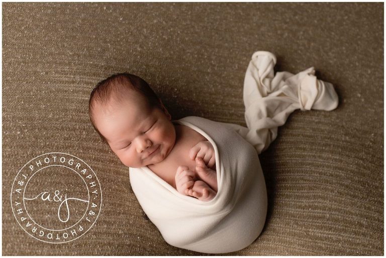swaddled-baby-boy-smiling