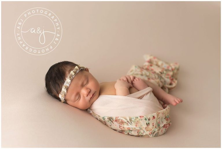 newborn-baby-wrapped-pink-swaddle